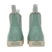 Pair of green Xtratuf boots shown from the back on a white background