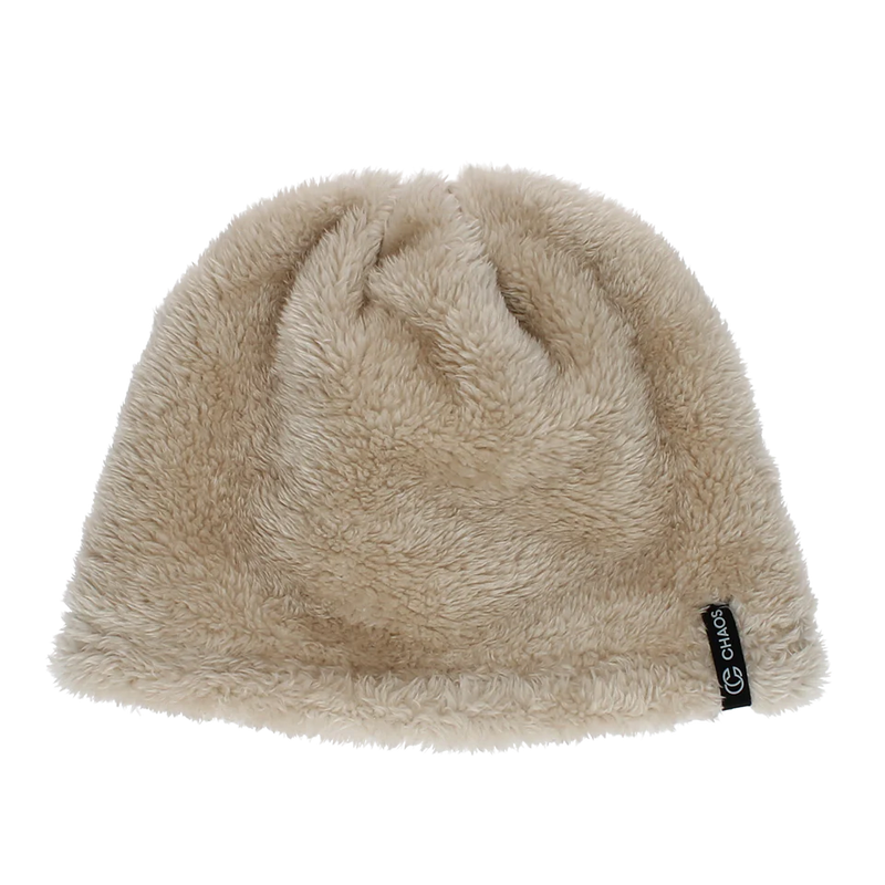 Sand brown colored fur beanie against a white background. 