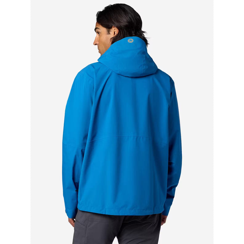 A man wearing a bright blue hooded jacket, shown from the back against a light gray studio background.