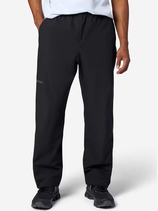 Person wearing black pants on a white background