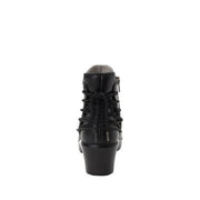 Back view of a black ankle boot with a lace pattern on the back against a white background. 