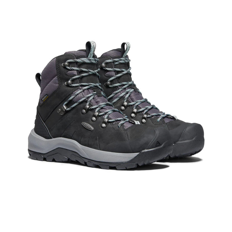 Pair of gray hiking boots with laces on a white background
