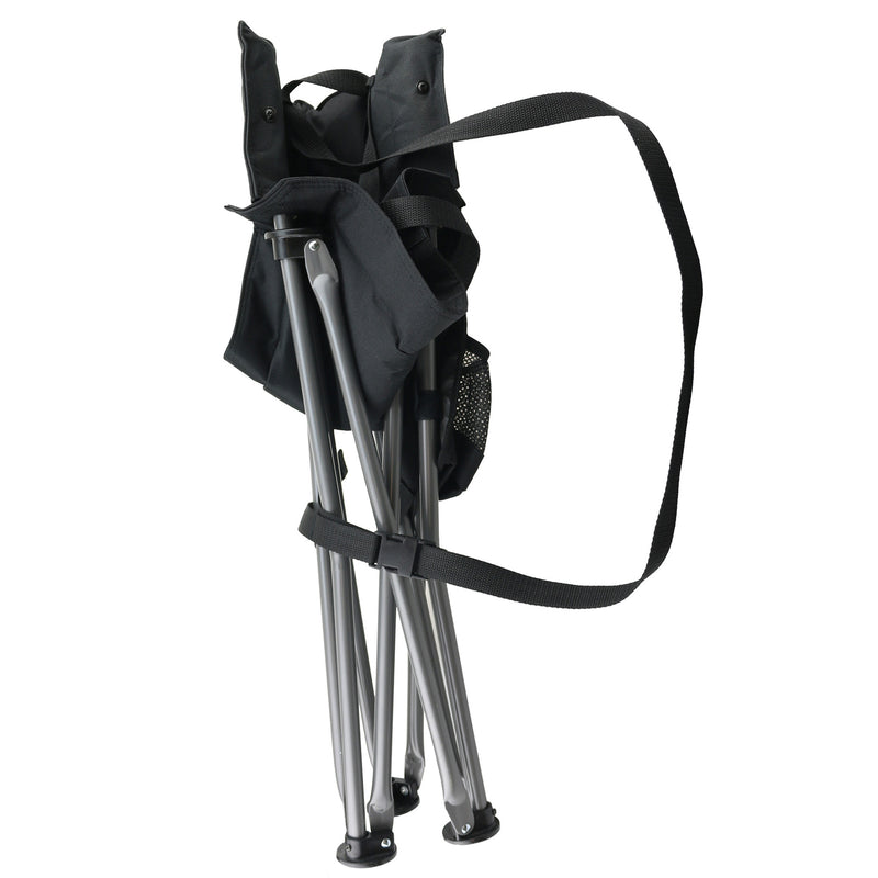 Black folding chair with carry strap on a white background