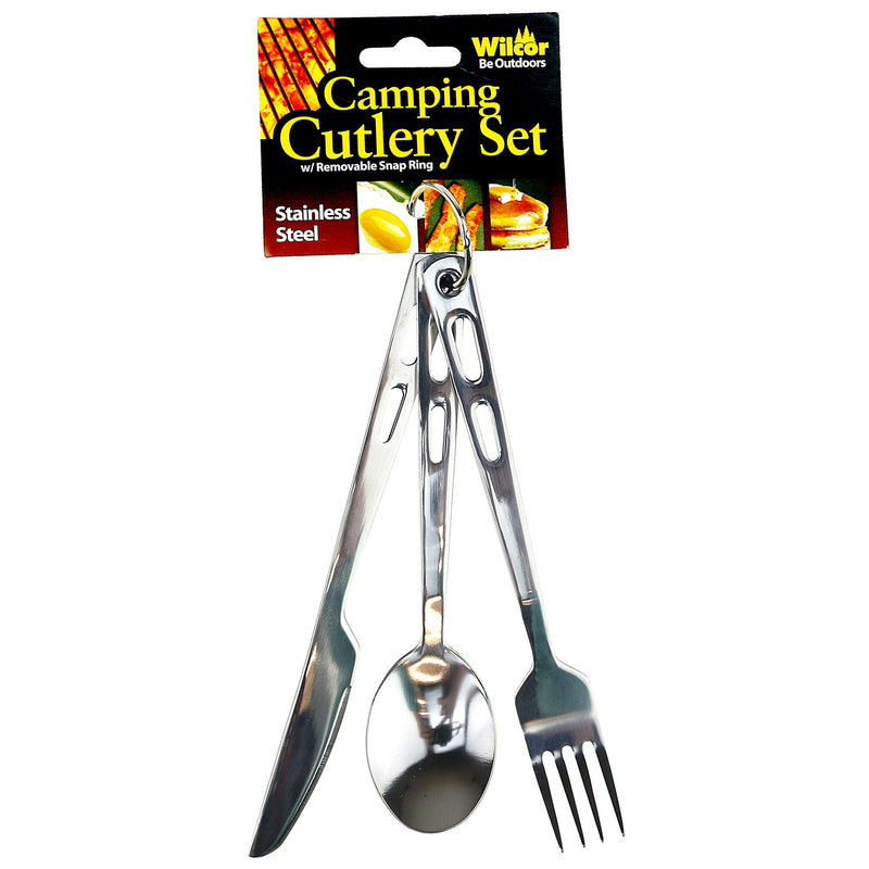 A stainless steel camping cutlery set with a knife, spoon, and fork attached to a black retail header card. The packaging reads 'Wilcor Outdoors Camping Cutlery Set' and 'Stainless Steel'.