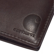 A brown wallet with a close up on the Carhartt logo on a white background