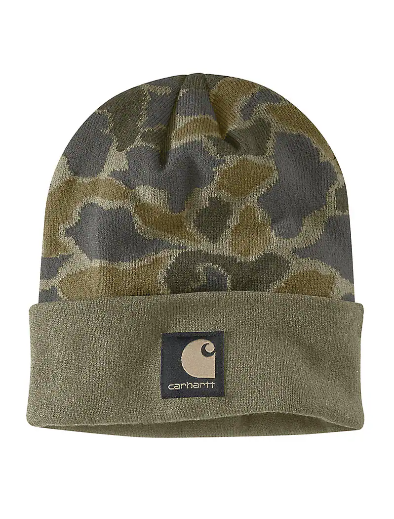 Dark green camouflage beanie featuring a Carhartt logo against a white background. 