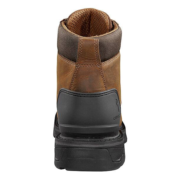 Brown and black work boot on a white background