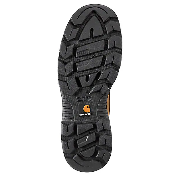 Close-up of a black boot sole with Carhartt logo on a white background