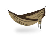 A tan hammcok with brown lining on a white background