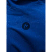 A close-up of a dark blue fabric with a subtle speckled texture and a circular logo featuring a lightning bolt, set against a white background.