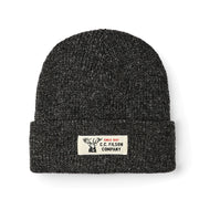 Dark gray beanie featuring a Filson logo against a white background. 
