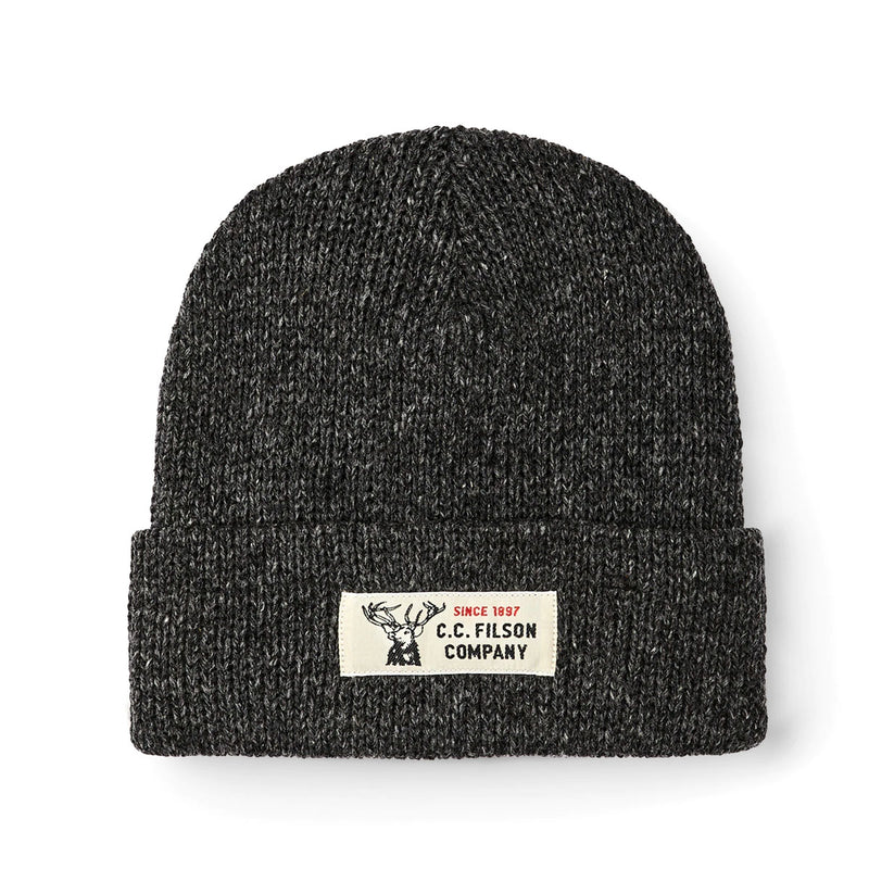Dark gray beanie featuring a Filson logo against a white background. 
