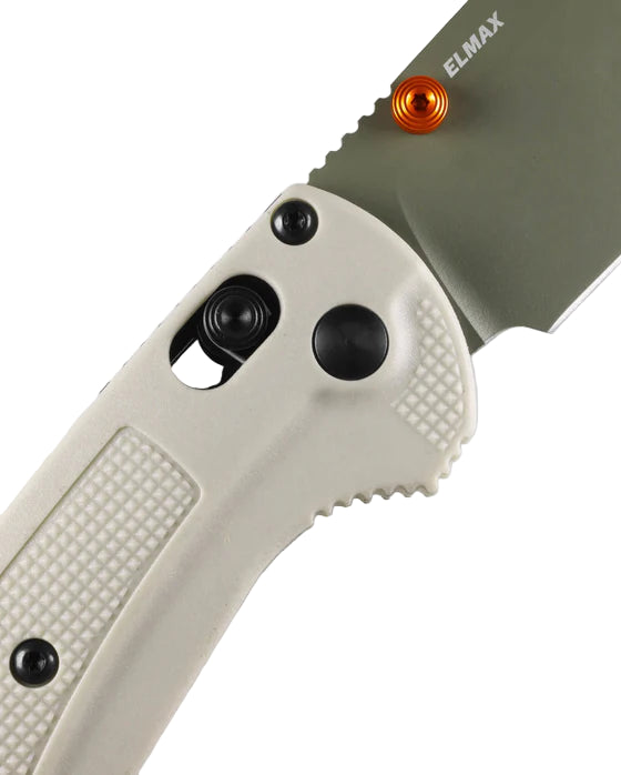 Close-up of a folding knife with a white handle and green blade on a white background