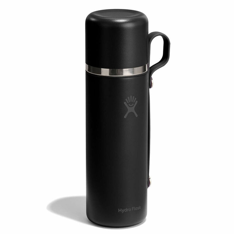 Black thermos with silver lid on a white background