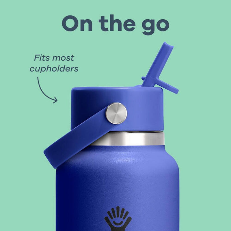 A close-up of a blue insulated water bottle with a matching blue lid and straw, shown on a mint green background with text reading 'On the go' and 'Fits most cupholders'.