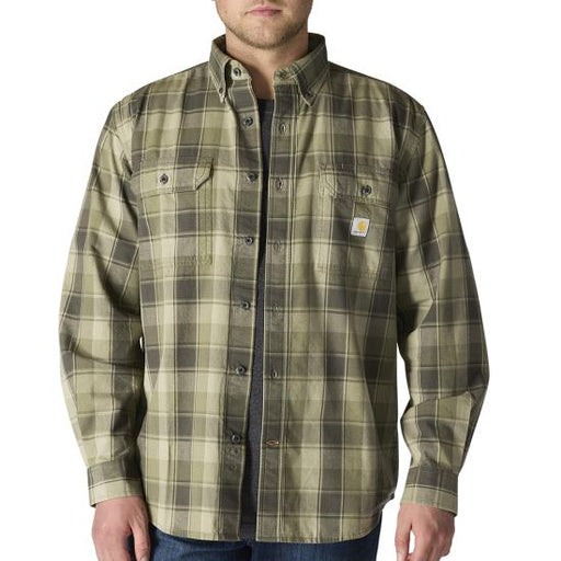 Green plaid shirt worn by a person on a white background