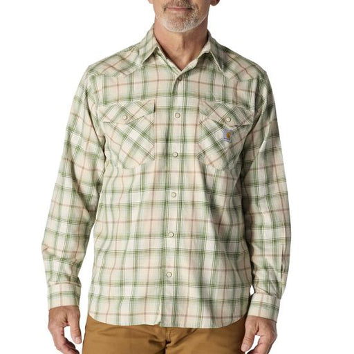 Man wearing a green and beige plaid shirt on a white background