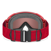 Red goggles with a black buckle on a white background