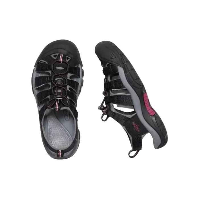 Pair of black and gray hiking sandals on a white background