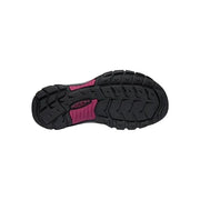 Black and pink sole of a shoe on a white background