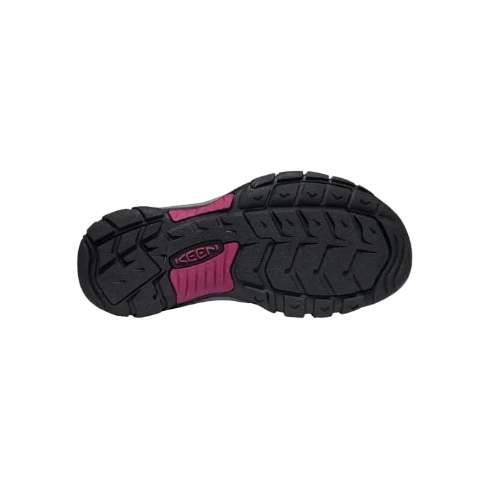 Black and pink sole of a shoe on a white background