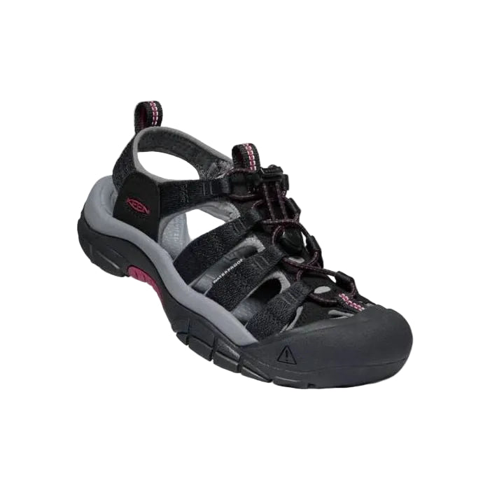 Black and gray sandal with pink accents on a white background