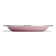 Pink enameled stainless steel plate on a white background