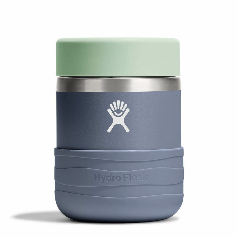 Hydro Flask insulated cup with a light green lid on a white background