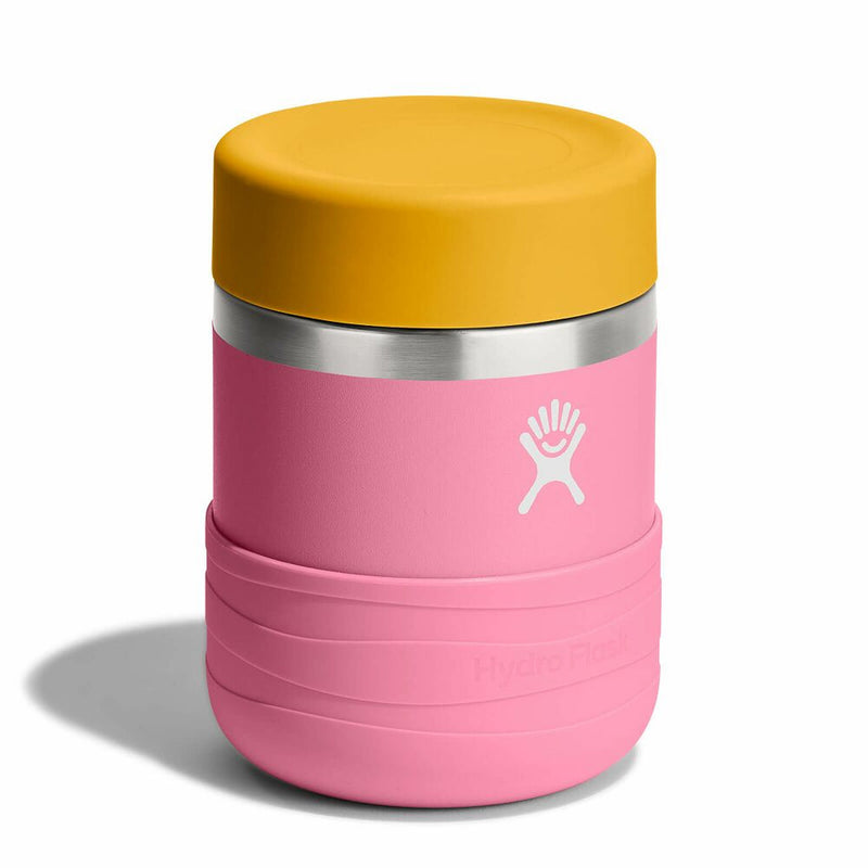 Pink thermos with yellow lid on a white background