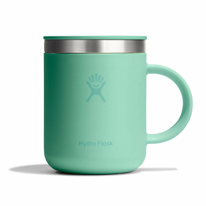 Mint green Hydro Flask mug with silver lid on a white background