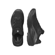 A pair of Salomon black trail running shoes shown from the top and side views against a solid white background.