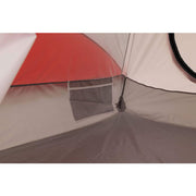 Close-up of a tent with red interior and gray exterior