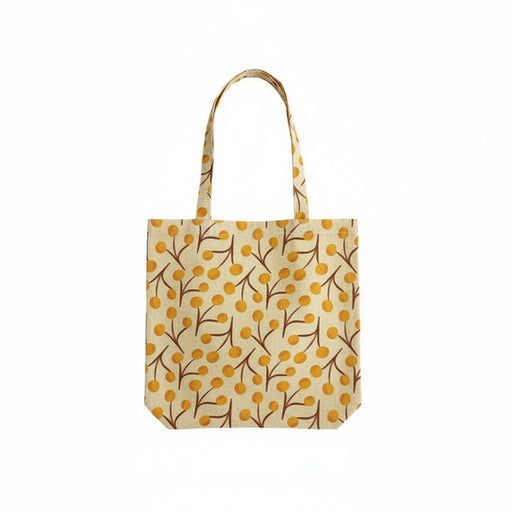Yellow patterned tote bag on a white background