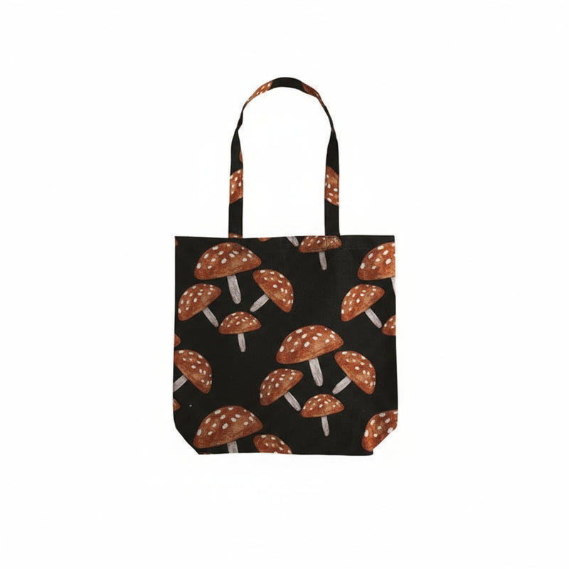 Tote bag with mushroom pattern on a black background