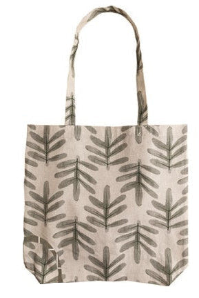Tote bag with leaf pattern on a beige background