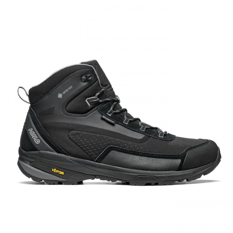 Side view of a black winter hiking boot against a white background. 