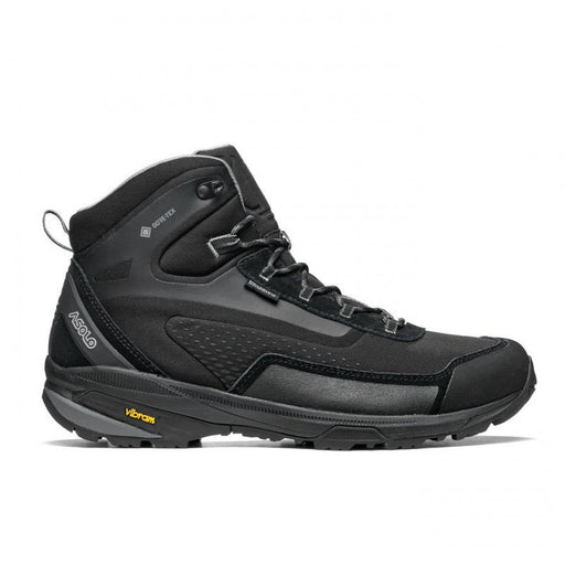 Side view of a black winter hiking boot against a white background. 