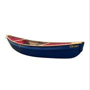 Dark blue canoe with accessories installed on a white background.