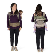 Woman using a baby carrier on a white background