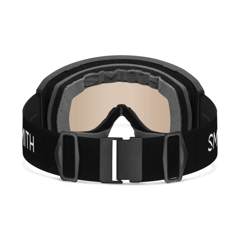 Black goggles with beige lens on a white background