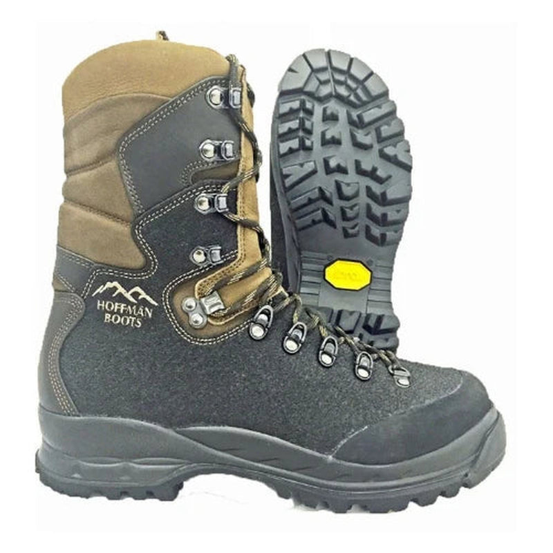 A black and light brown 8" Hoffman boots work boot shown from the side, with the mate's sole in the background, on a white canvas