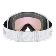 Snow goggles with pink lenses and white frame on a white background