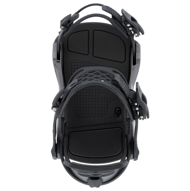 Black snowboard bindings on a white background