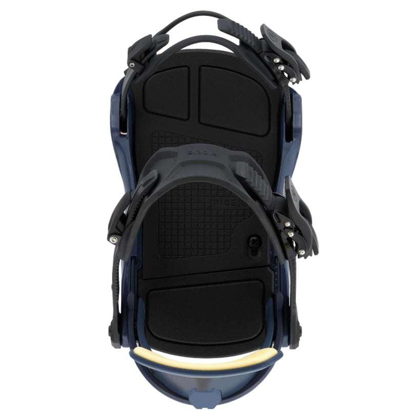 Pair of blue and black snowboard bindings on a white background