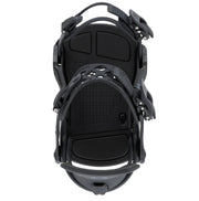 Black snowboard bindings on a white background