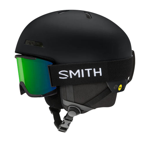 Black Smith ski helmet with green goggles on a white background