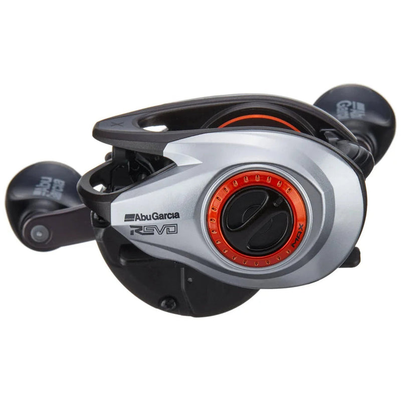 A black and gray fishing reel with red details on a white background