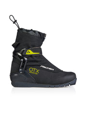 Side view of a black ski boot with yellow accents against a white background. 
