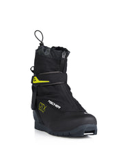 Side view of a black ski boot with yellow accents against a white background. 