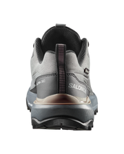 Gray Salomon hiking shoe on a white background
